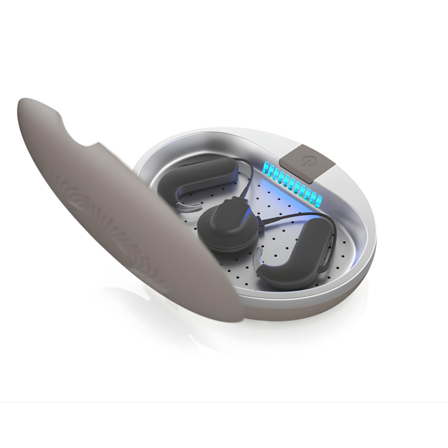 Dry-Space UV open droogbox met hoortoestellen binnenin en blauwe UV-lichtreiniging actief Dry-Space UV open droogbox met hoortoestellen binnenin en blauwe UV-lichtreiniging actief