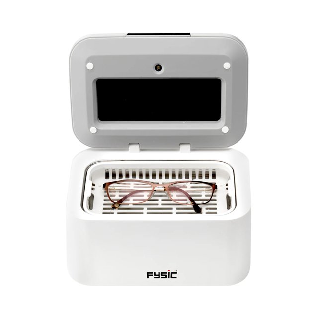 Bril geplaatst in de Fysic FC-35 ultrasoon reiniger met open klep Bril geplaatst in de Fysic FC-35 ultrasoon reiniger met open klep