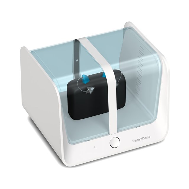 PerfectDome UV-reiniger transparante kap gesloten over hoortoestellen in oplaadstation